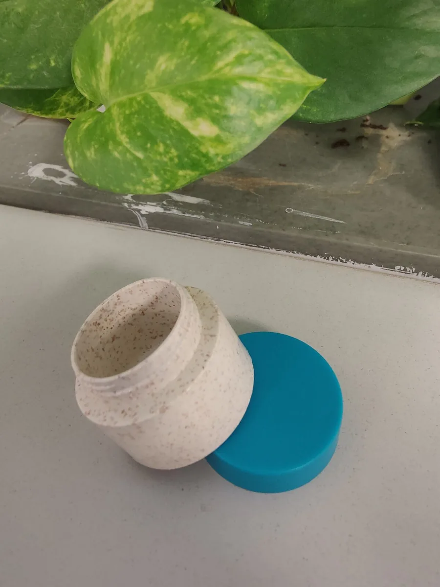 IDA jar, open, with blue cap